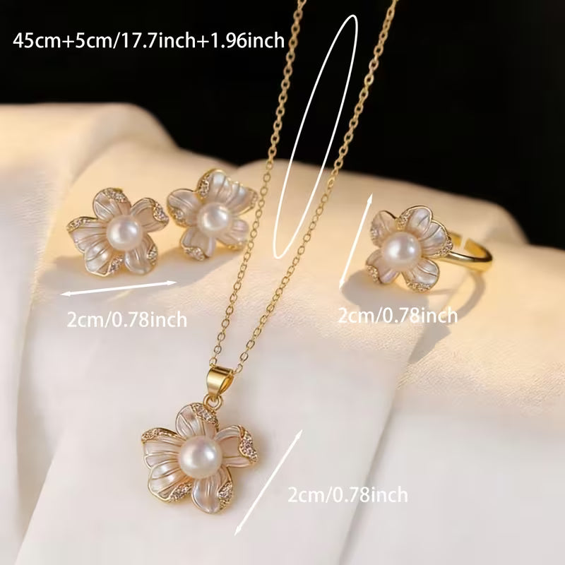 A Set of Three Pieces Including a Necklace, Ring, And Earrings Designed in a Light Luxury French Style with Faux Pearl Flowers
